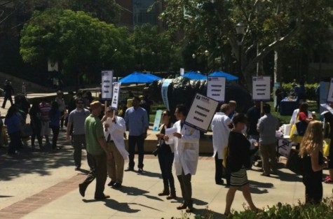 Local doctors utilize their right to protest at a rally for student health on the UCLA campus on April, 11.
