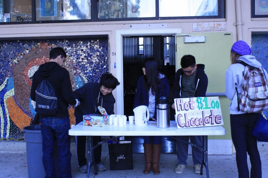 Interact Club members sell hot chocolate in the quad.