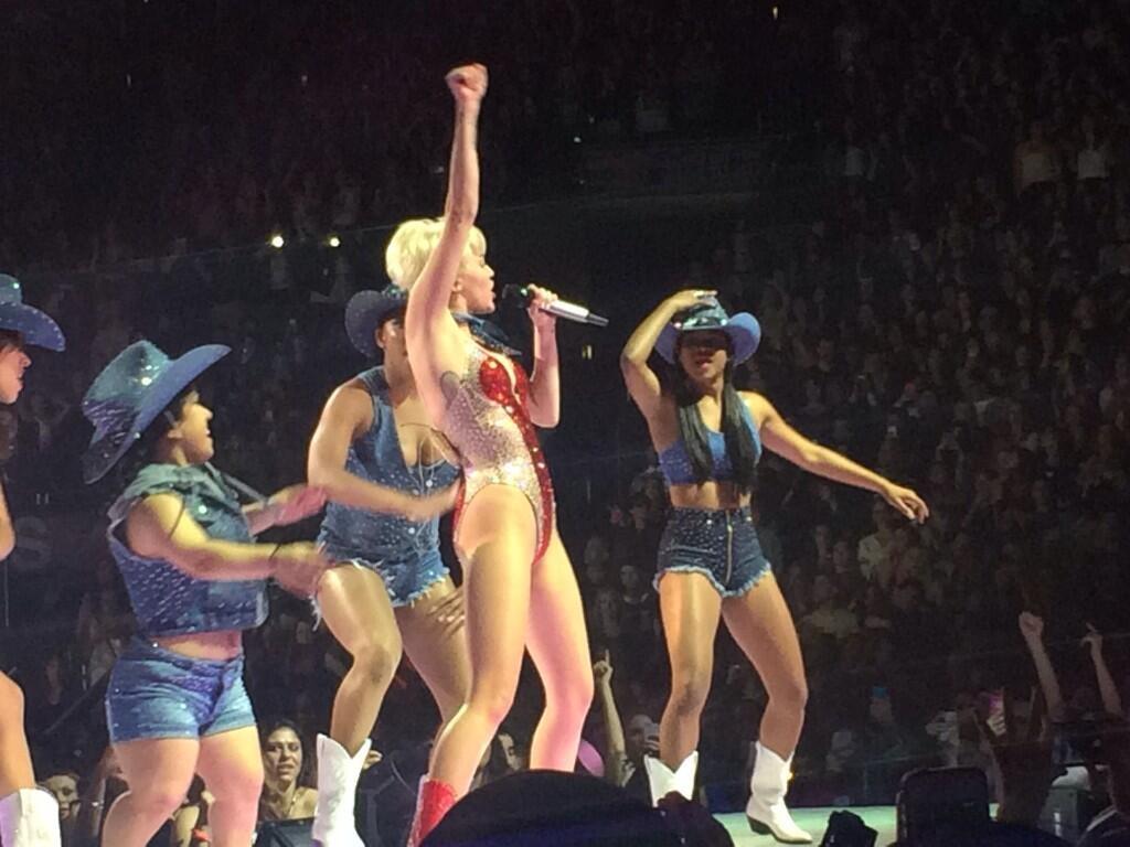 Cyrus performing onstage at the 2/25/14 show at SAP Center in San Jose, CA.