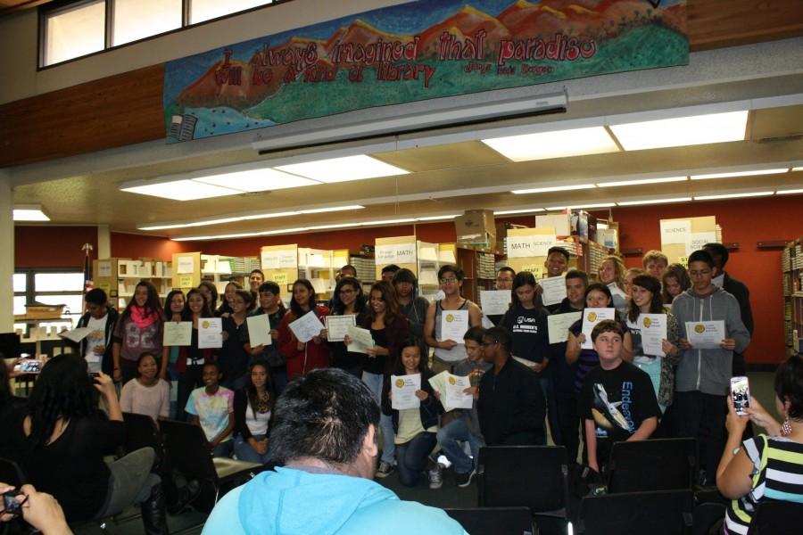 Here are the fifty students holding up their Student of the Month certificates. Each student looked happy and excited to be given their awards. 