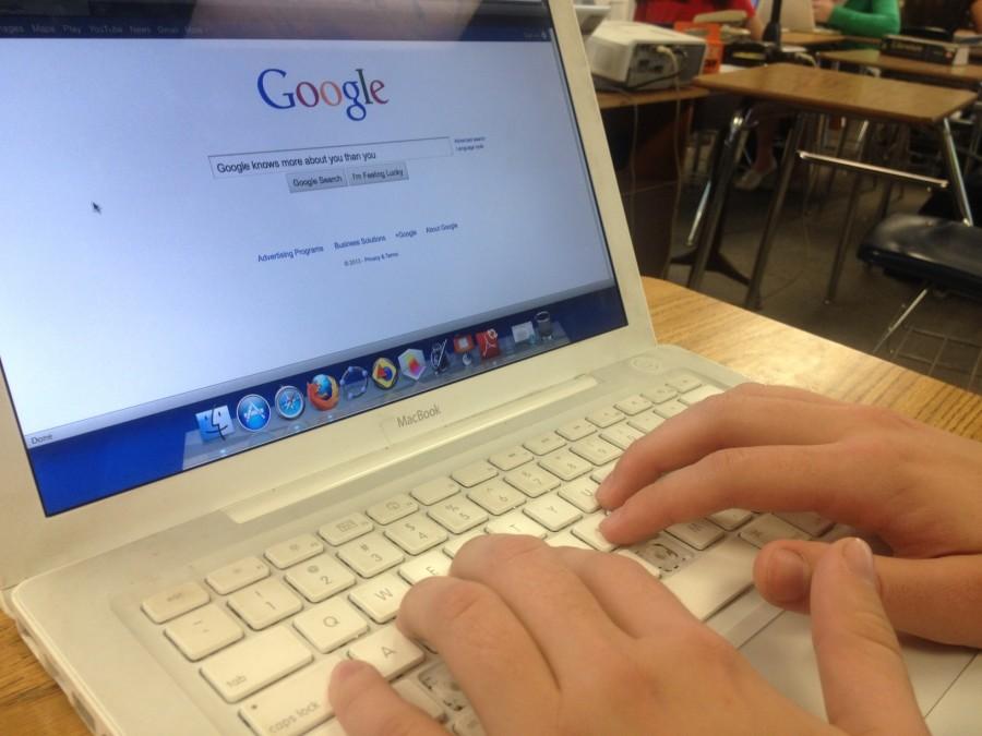 A student utilizes Google as an information tool.