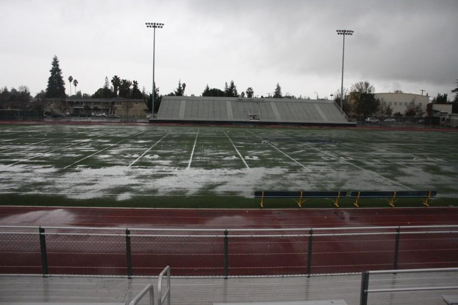 The football field was covered with puddles on Dec. 11.