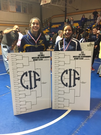 Haven(right) poses with the 126 LB CCS Champion from North Dame High School(left).