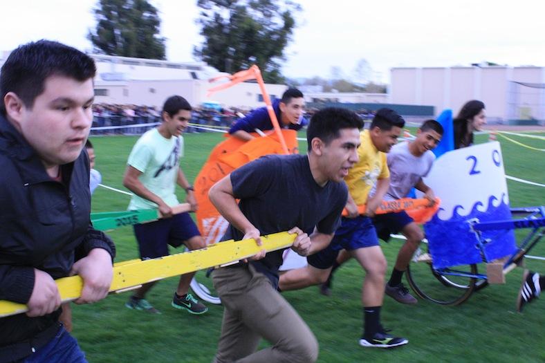 Students participate in Chariot Racing, which was one of the March Madness events in 2014.
