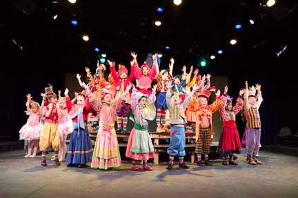 The cast of The Wizard of Oz comes together for a musical number during dress rehearsal. Photo taken from the Lincoln website.
