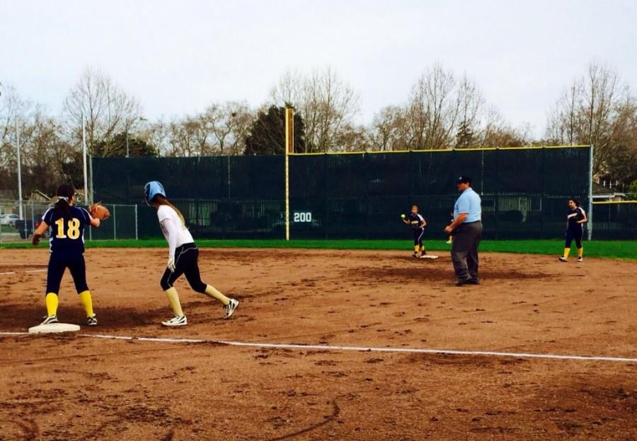 The 2014 softball team plays a game.