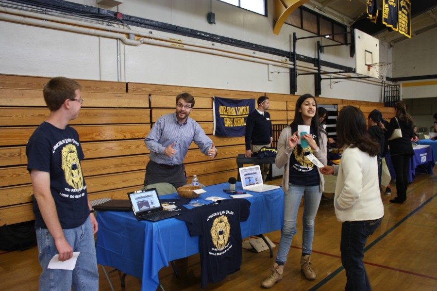 Lincoln Lion Tales hosted an informational table for all freshmen interested in journalism next year.  Pictured from left to right: Eli Schenk, Mr. Alpers, and Bahaar Muhar (Lincoln Lion Tales/Felicia Viano)