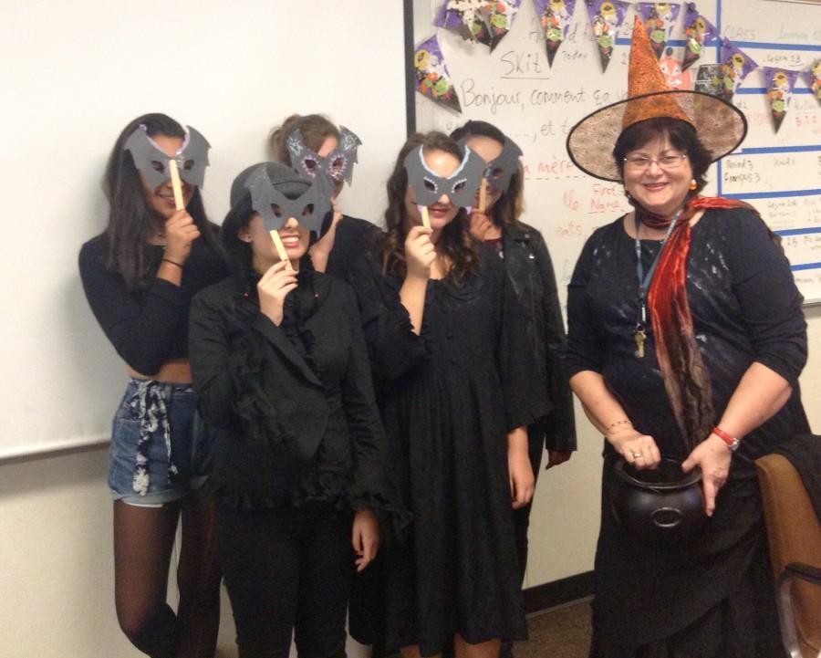 Madame Barbu poses with the Bat Family ( F. Ramirez / Lion Tales )