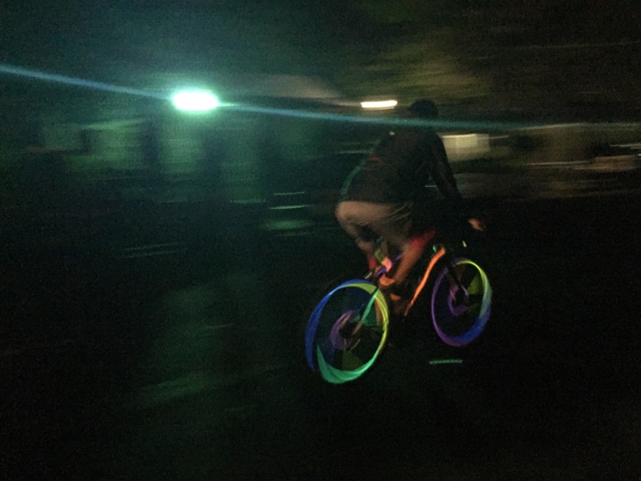 Sal riding bike with glow sticks for bp(Salvador Cohenete/lion tales)
