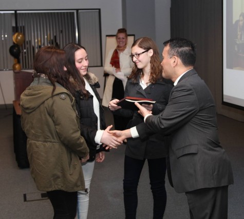 Students are being given awards during Mock Trial competition(names from left to right: