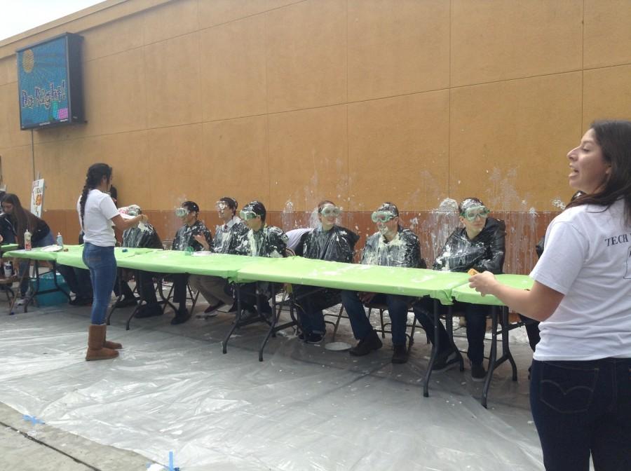 Students throwing pies at teachers in 2016. (Jacqueline Moncada / Lion Tales)