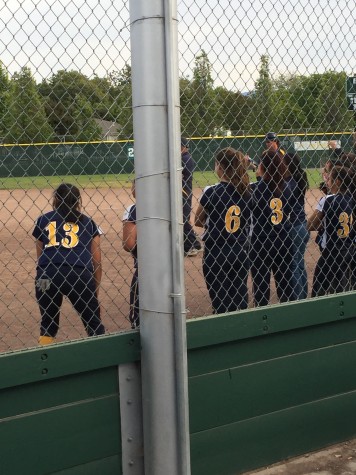 Players are lined up waiting to hear the rules from the umpires. (Emalie Ortega/Lincoln Lion Tales)