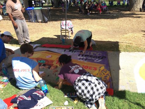 Trader Joe's employees work on their chalk art mural (Jackie Vi/Lincoln Lion Tales)