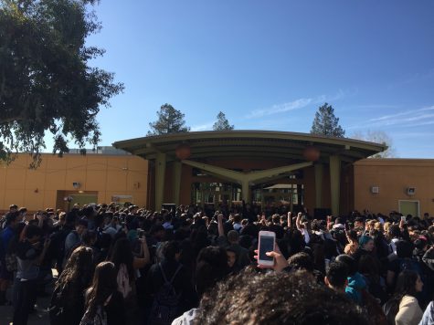Students walkout to protest election results at Lincoln High School in San Jose, California on November 9, 2016. Students hold up a fist together to show unification. (Brandon Sullivan/ Lincoln Lion Tales)