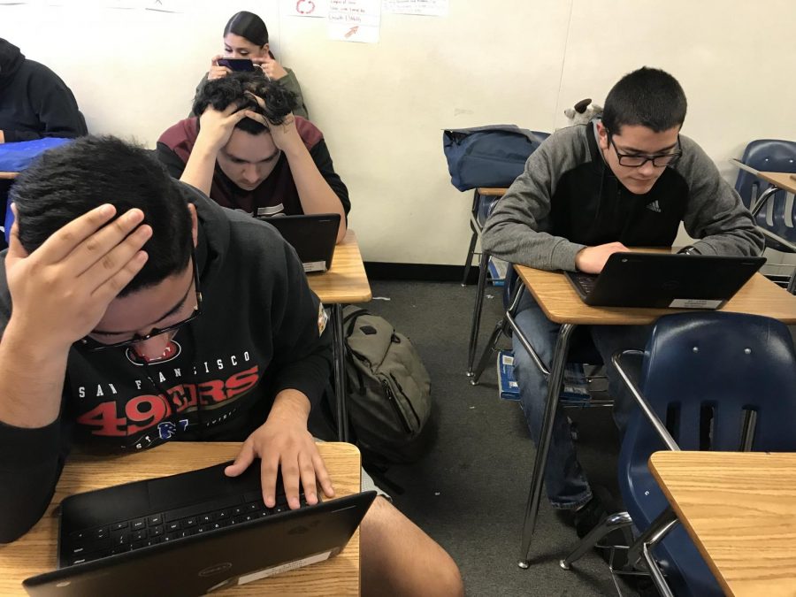 3 high school students (Ernesto Garcia, Isidro Vargas, Robert Correa) stressed for finals(Anjanai Vallez/Lincoln Lion Tales)