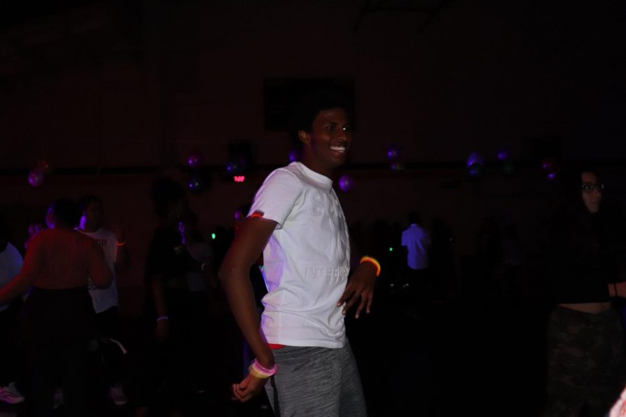 Ilyass Sugal busting some moves. He attended the Glow Up Dance (Yearbook for Lincoln Lion Tales).