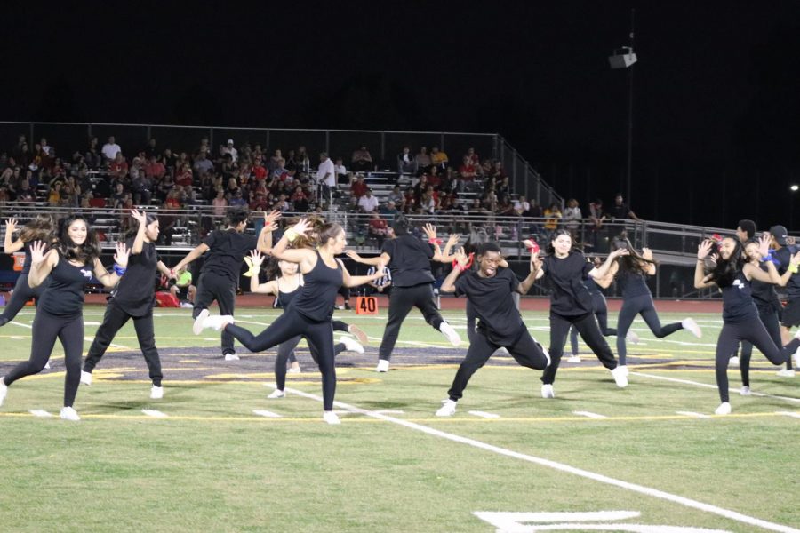 Dancers surprising the audience with their jumps. The Lincoln Convertibles and Lincoln Performance Company were dancing halftime with special guest: Willow Glen High School. September 13, 2019 at the Lincoln Football Field (Emilia Kendrick/Lion Tales)