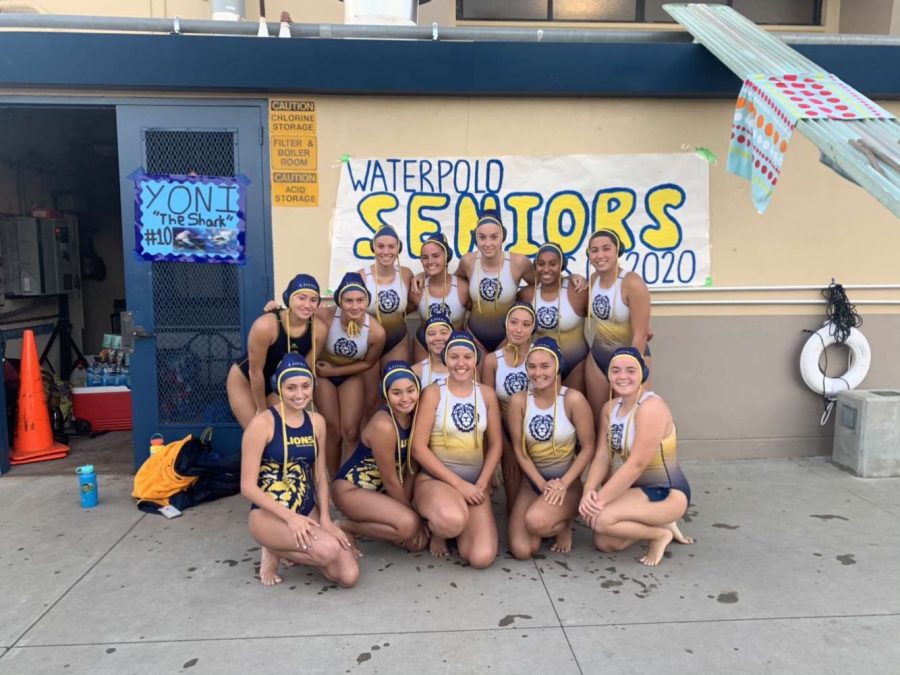 Girls Water Polo seniors smiling for the camera. Girls won against Mt. Pleasant 19-1 for their Senior Night. September 18, 2019 located at the Lincoln pool (Jeff Canyon/Yearbook). 